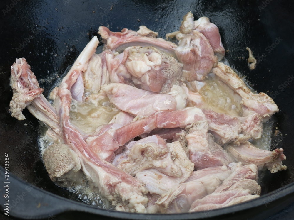 meat is fried in a cauldron meat is fried in a cauldron