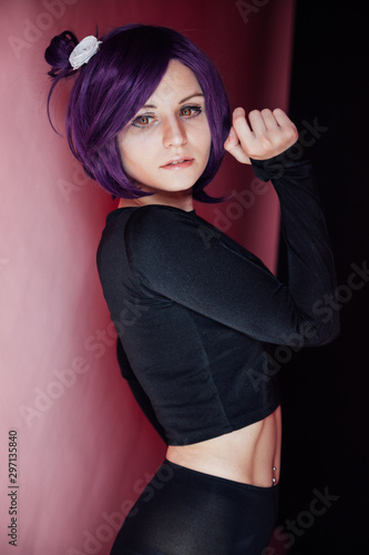 Girl cosplayer with purple hair anime Japan photo