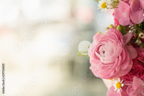 Close up of beautiful pink rose and many flower bouquet under sunlight and copy space. Using as nature wallpaper and background.