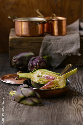 natural purple vegetables artichokes for salad and canning photo