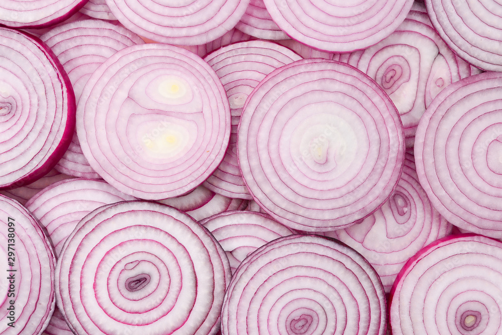 Onion slices as a background. Top view. - obrazy, fototapety, plakaty 