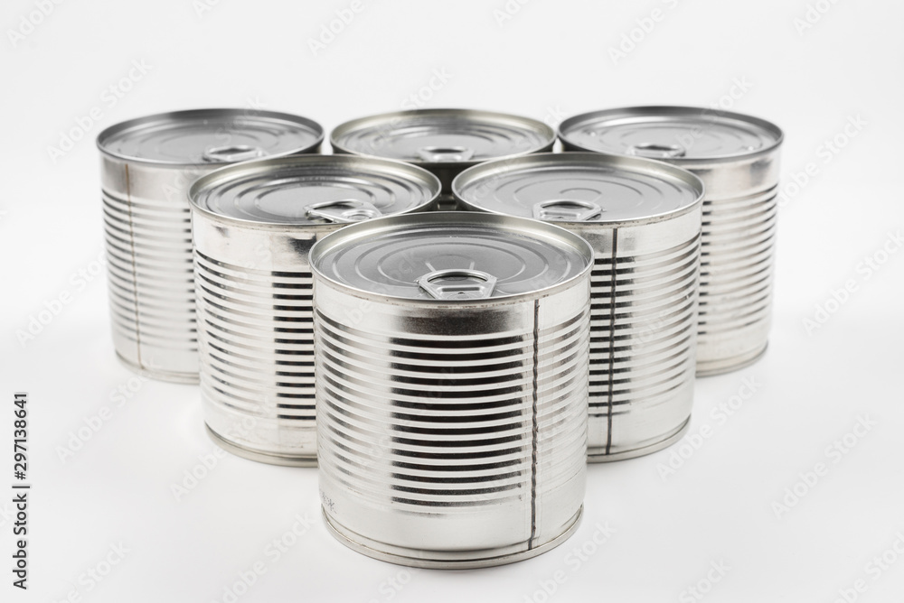 Group of silver canned food on white background. Group of silver canned food on white background.