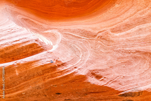 Orange sandstone abstract closeup of rock formations at Antelope slot canyon in Arizona on trail from Lake Powell with lines and shapes