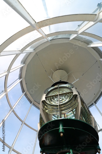 Interior of a lighthouse with optical device with fresnell lenses and lamp.