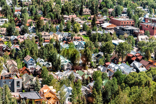 Telluride, Colorado small town houses with aerial high angle bird's eye view of city cityscape from free gondola to mountain village in summer photo