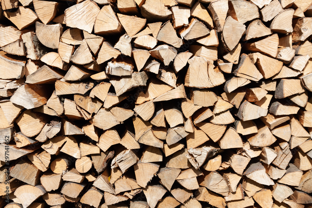 Pile of wood for the stove or fireplace. For background use. Pile of wood for the stove or fireplace. For background use.