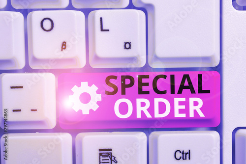 Writing note showing Special Order. Business concept for Specific Item Requested a Routine Memo by Military Headquarters White pc keyboard with note paper above the white background photo