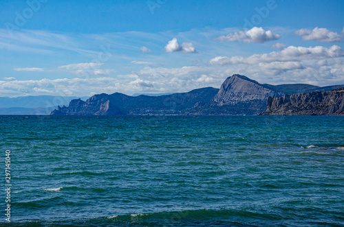 Seascape  sea and mountains  sunny summer day.