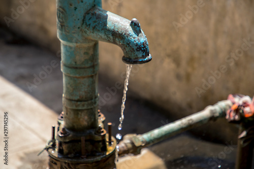 Fototapeta Naklejka Na Ścianę i Meble -  Indian hand pump using to suck and bring ground water