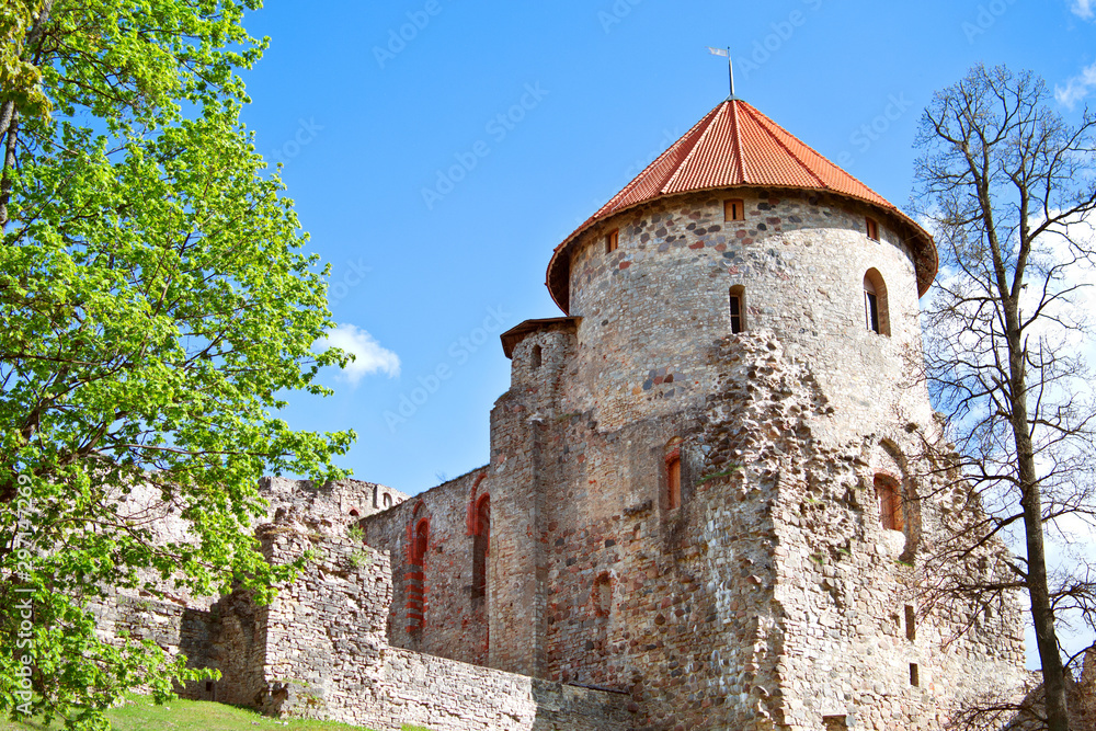 View to Medieval Livonian castle tower in oldest Latvian town Cesis at spring View to Medieval Livonian castle tower in oldest Latvian town Cesis at spring