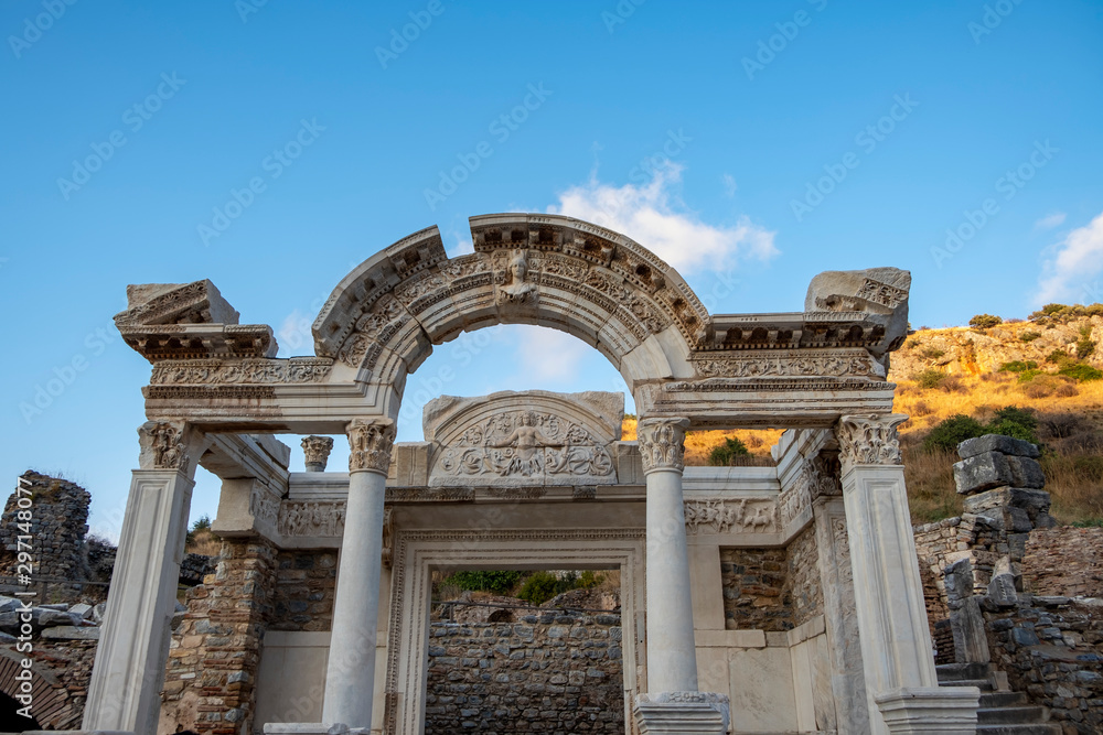 EPHESUS, TURKEY: Marble reliefs in Ephesus historical ancient city, in Selcuk,Izmir,Turkey.Figure of Medusa with ornaments of Acanthus leaves,Detail of the Temple of Hadrian. EPHESUS, TURKEY: Marble reliefs in Ephesus historical ancient city, in Selcuk,Izmir,Turkey.Figure of Medusa with ornaments of Acanthus leaves,Detail of the Temple of Hadrian.