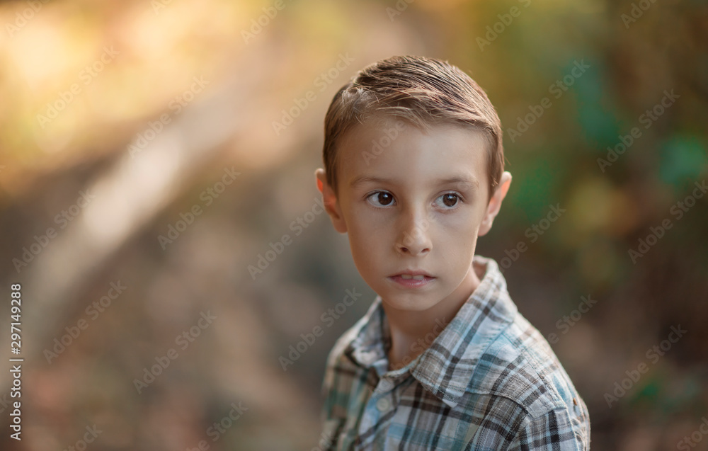 handsome boy, portrait outdoor with natural autumn background handsome boy, portrait outdoor with natural autumn background
