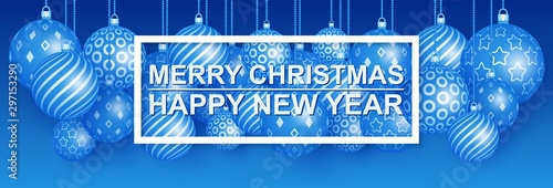 Merry Christmas and happy New year. Wide canopy with a Variety of suspended balls. Blue background.