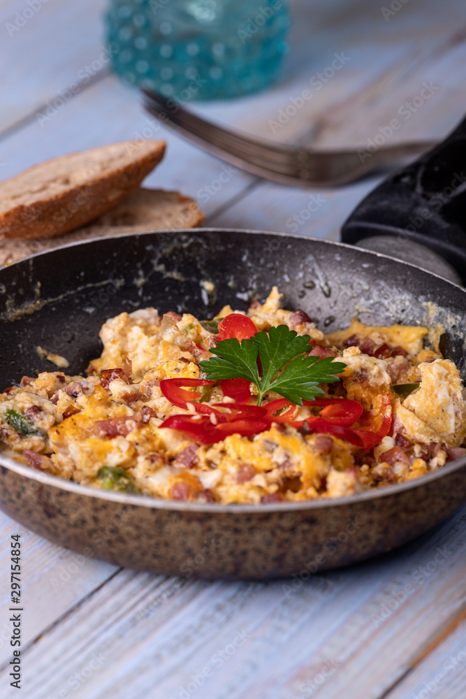 closeup of scrambled eggs in a pan