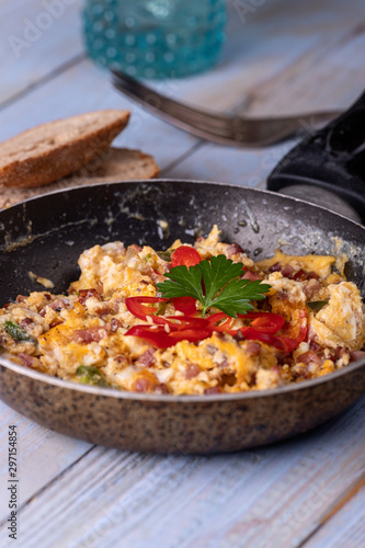 closeup of scrambled eggs in a pan