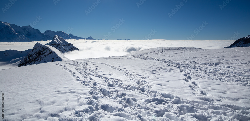 Panorama of mountains rising from the clouds Panorama of mountains rising from the clouds
