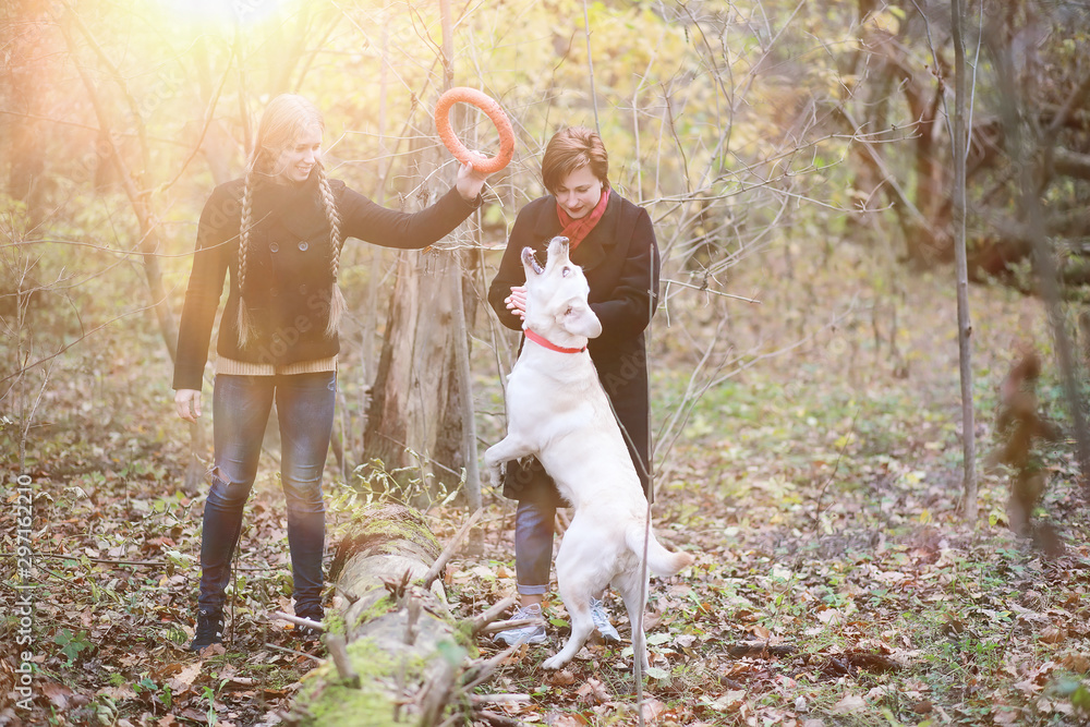 Fototapeta premium Young girl on a walk in the autumn