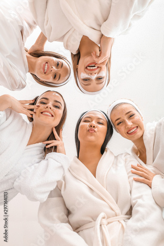 Happy young women in bathro...