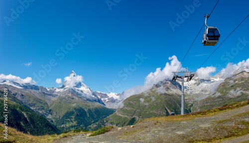 Scenic view on mountain Matterhorn and cable car in Valais region, Switzerland, Europe photo