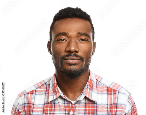Portrait of handsome African-American man on white background