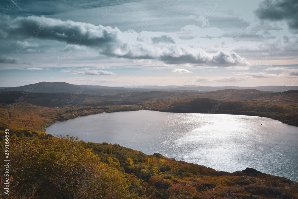 Mountain landscape with a lake, mountains and forest in autumn. Sanabria Lake, Zamora, Spain