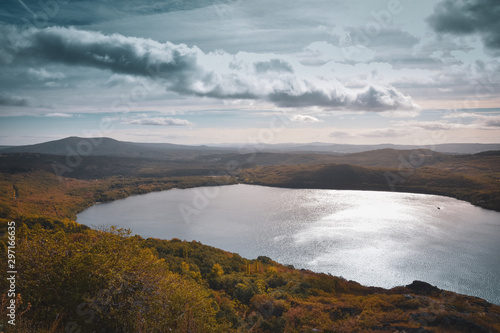Mountain landscape with a lake, mountains and forest in autumn. Sanabria Lake, Zamora, Spain