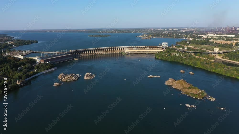 Aerial view of the Hydroelectric Dam in industrial city. Moving the camera forward on the subject. Aerial view of the Hydroelectric Dam in industrial city. Moving the camera forward on the subject.