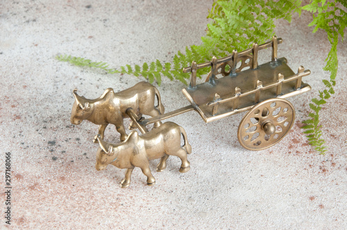 Antique bronze ox and cart sculpture