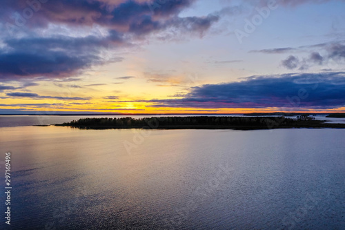 Evening sunset by the water aerial. Sunset on nature travel antenna