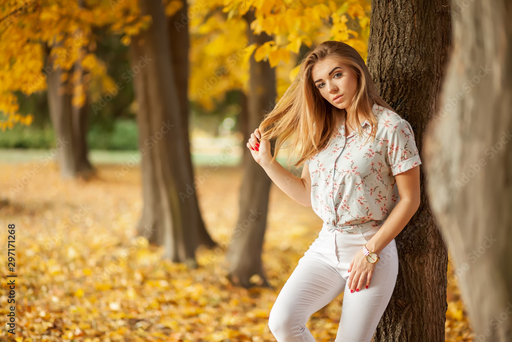 Beautiful woman enjoying in autumn forest Beautiful woman enjoying in autumn forest