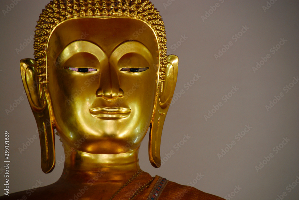 Golden Buddha head of statue in temple in Bangkok  