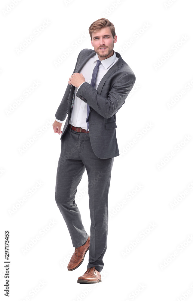 in full growth. young businessman taking a step to success in full growth. young businessman taking a step to success