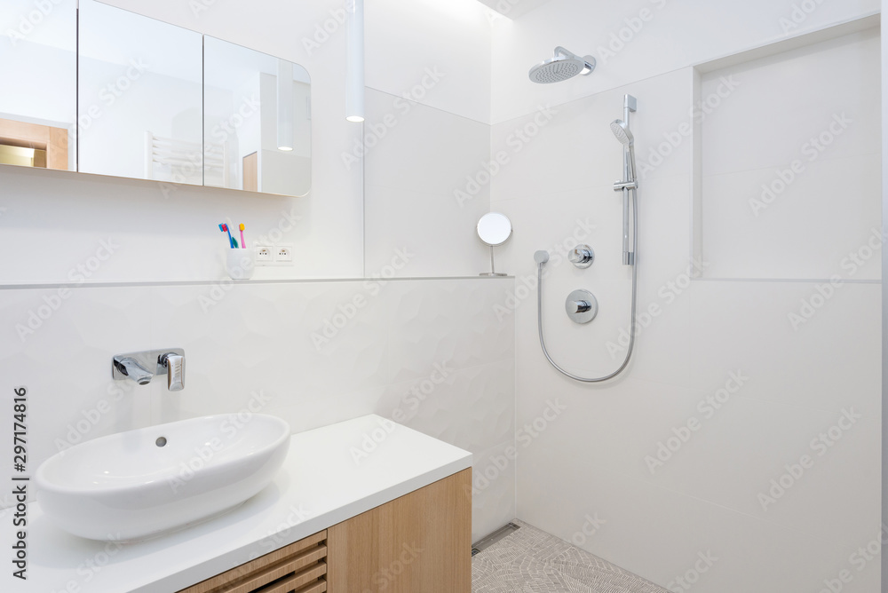 Interior of contemporary bathroom with bathtub and shower Interior of contemporary bathroom with bathtub and shower