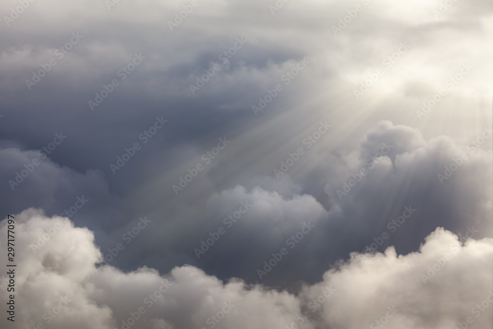 Dramatic stormy sky with sunbeams Dramatic stormy sky with sunbeams