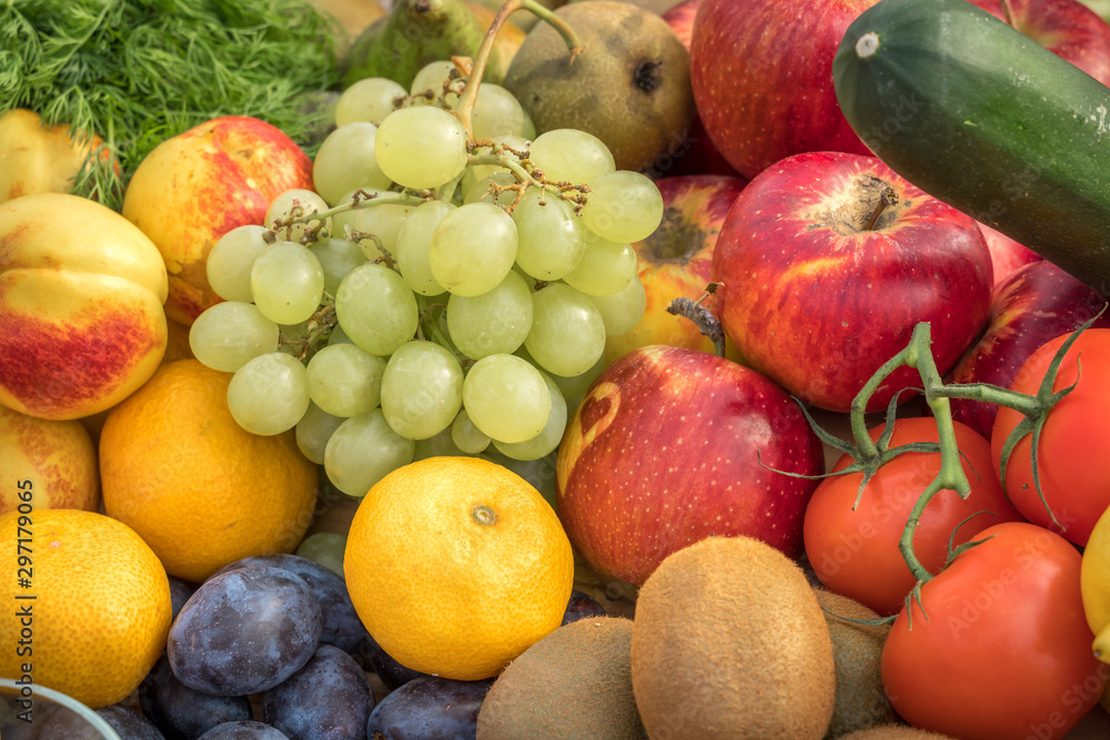Different fruits and vegetables all over the table Different fruits and vegetables all over the table