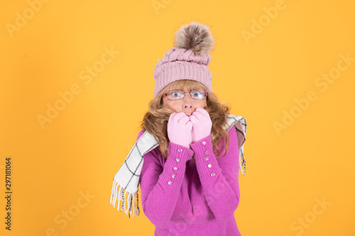 woman with cold expression wearing warm clothes