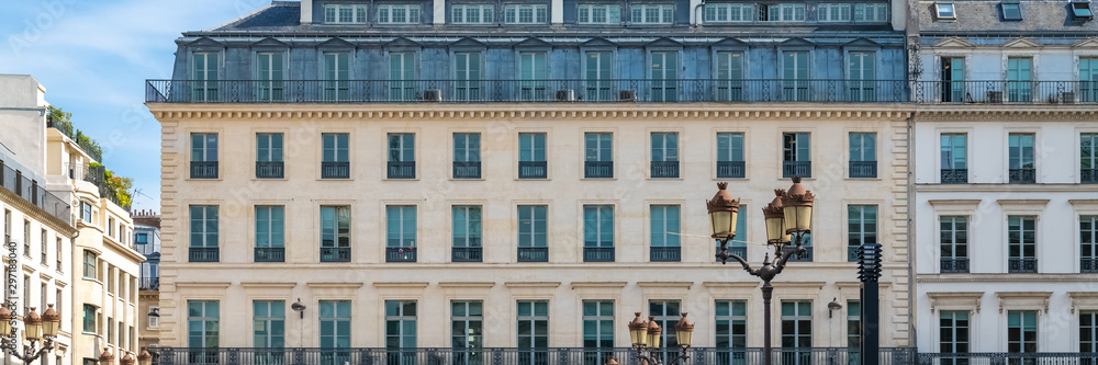 Paris, France, beautiful building, panorama of a typical parisian facade