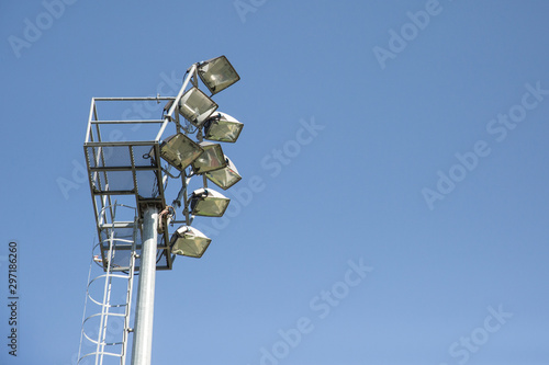 Sports stadium light tower during the day