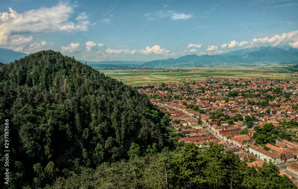Ancient city of Rasnov in Romania. Panorama of the city from the air