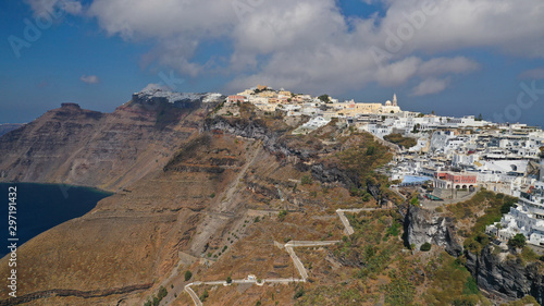 Aerial drone photo of Fira main village of Santorini island with breathtaking views to Caldera and Aegean sea, Cyclades, Greece