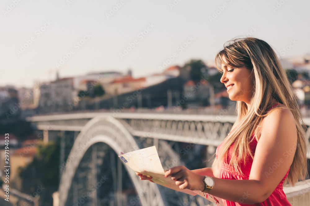 Woman enjoying sunset at Porto - Portugal