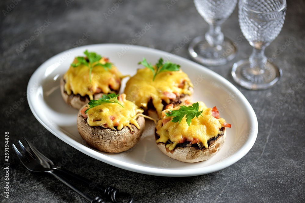 Stuffed mushrooms with smoked meat, fried onions and hard cheese. Stuffed mushrooms with smoked meat, fried onions and hard cheese.