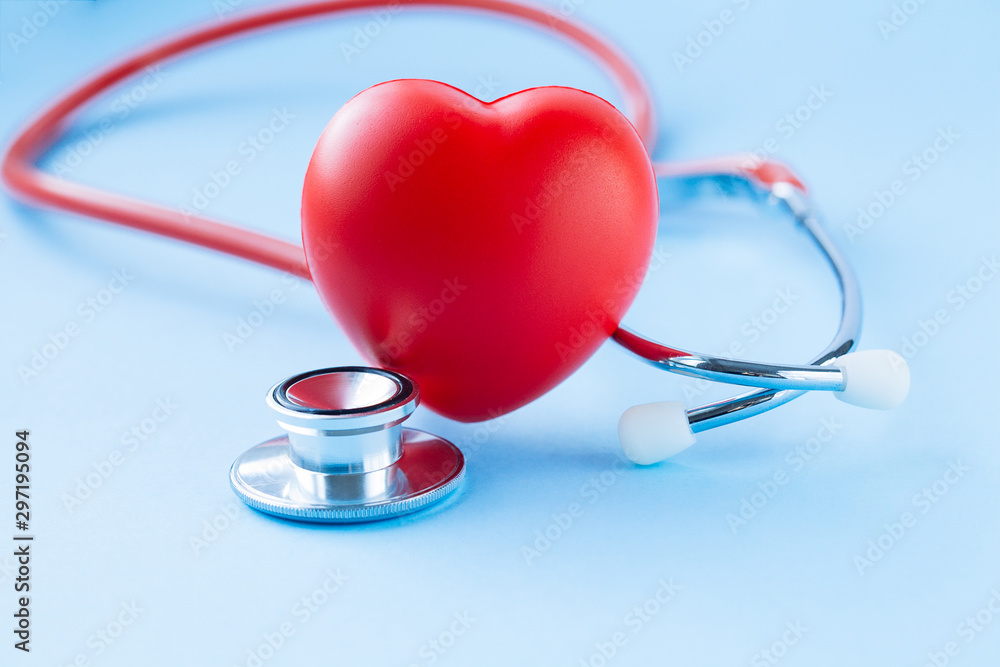 Stethoscope and red heart on blue background. Stethoscope and red heart on blue background.