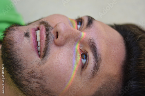 portrait of a man with rainbow