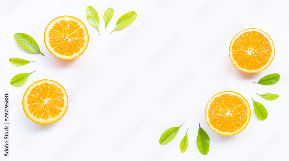 Frame made of fresh orange fruit with green leaves on white Frame made of fresh orange fruit with green leaves on white