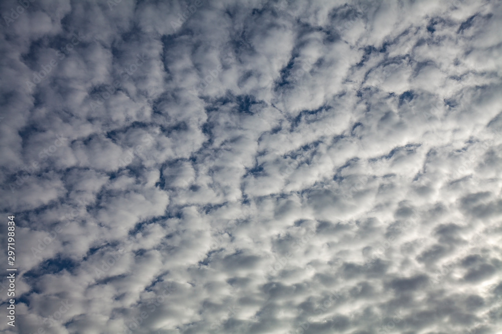 Background image - blue sky in high relief clouds Background image - blue sky in high relief clouds
