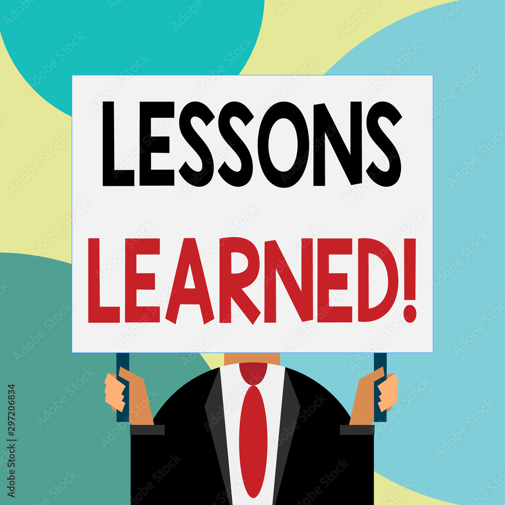 Handwriting text writing Lessons Learned. Conceptual photo experiences distilled project that should actively taken Just man chest dressed dark suit tie no face holding blank big rectangle Handwriting text writing Lessons Learned. Conceptual photo experiences distilled project that should actively taken Just man chest dressed dark suit tie no face holding blank big rectangle