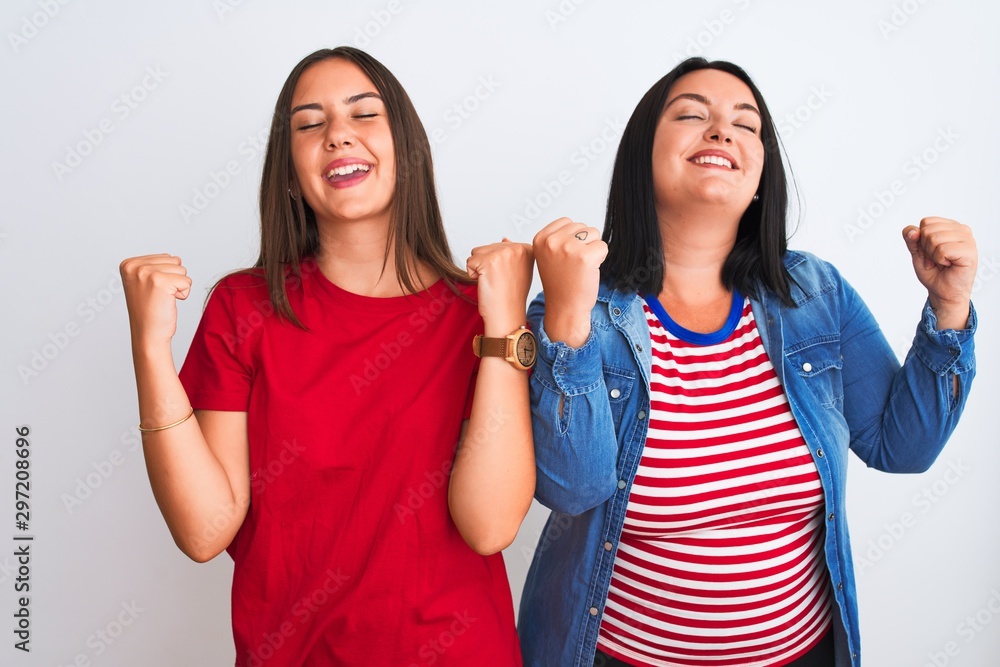 Young beautiful women wearing casual clothes standing over isolated white background celebrating surprised and amazed for success with arms raised and eyes closed. Winner concept. Young beautiful women wearing casual clothes standing over isolated white background celebrating surprised and amazed for success with arms raised and eyes closed. Winner concept.