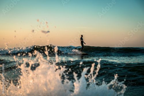 Fototapeta Naklejka Na Ścianę i Meble -  Surfing, Long board and the Sea.