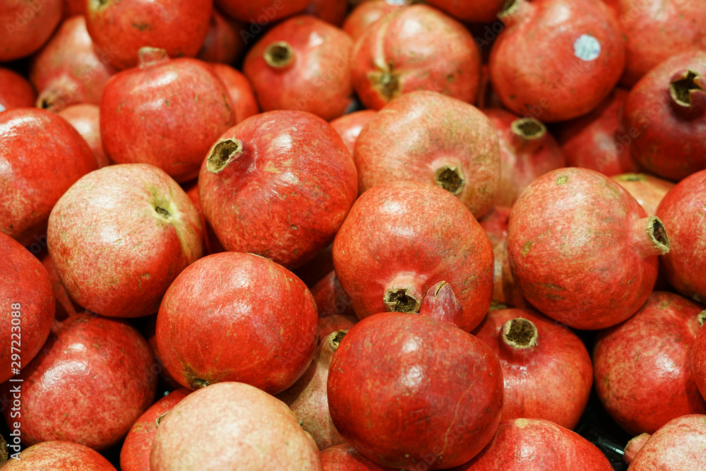 fresh pomegranate in pile as food background fresh pomegranate in pile as food background